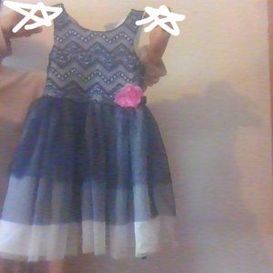 A kids blue and white on occasion dress.